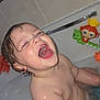 baby, bath, bathtub, bubbles, child, cute, fun, happy, indoors, joy, kid, laughing, play, playful, skin, smile, toy, toddler, water, wet