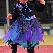 Stella joined the competition — help win amazing prizes! black_tights, blue, boots, child, curly_hair, cute, dress, fun, happy, joyful, legs, motion, outdoor, person, playground, purple, smiling, spiderweb, toddler, young