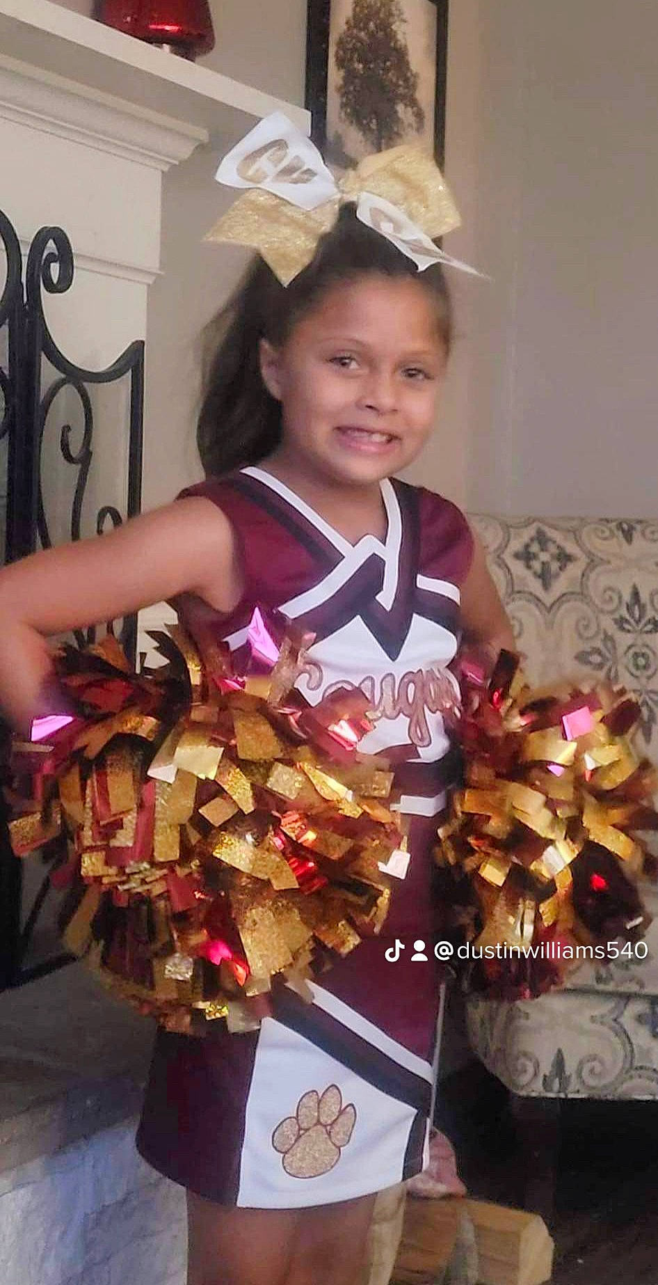 Nyeshia joined the competition — help win amazing prizes! cheerleading, cheerleading_uniform, child, competition_event, costume, dance, event, fashion_accessory, fashion_design, fun, glove, happy, joy, person, pom_pom, room, smile, sports_uniform, sportswear, team