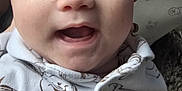 Ava-Mae joined the competition — help win amazing prizes! baby, infant, smiling, onesie, cartoon_print, face, closeup, foot, nail_polish, bag, fabric, cute, happy, child, portrait, clothing, indoor, person, apparel, skin