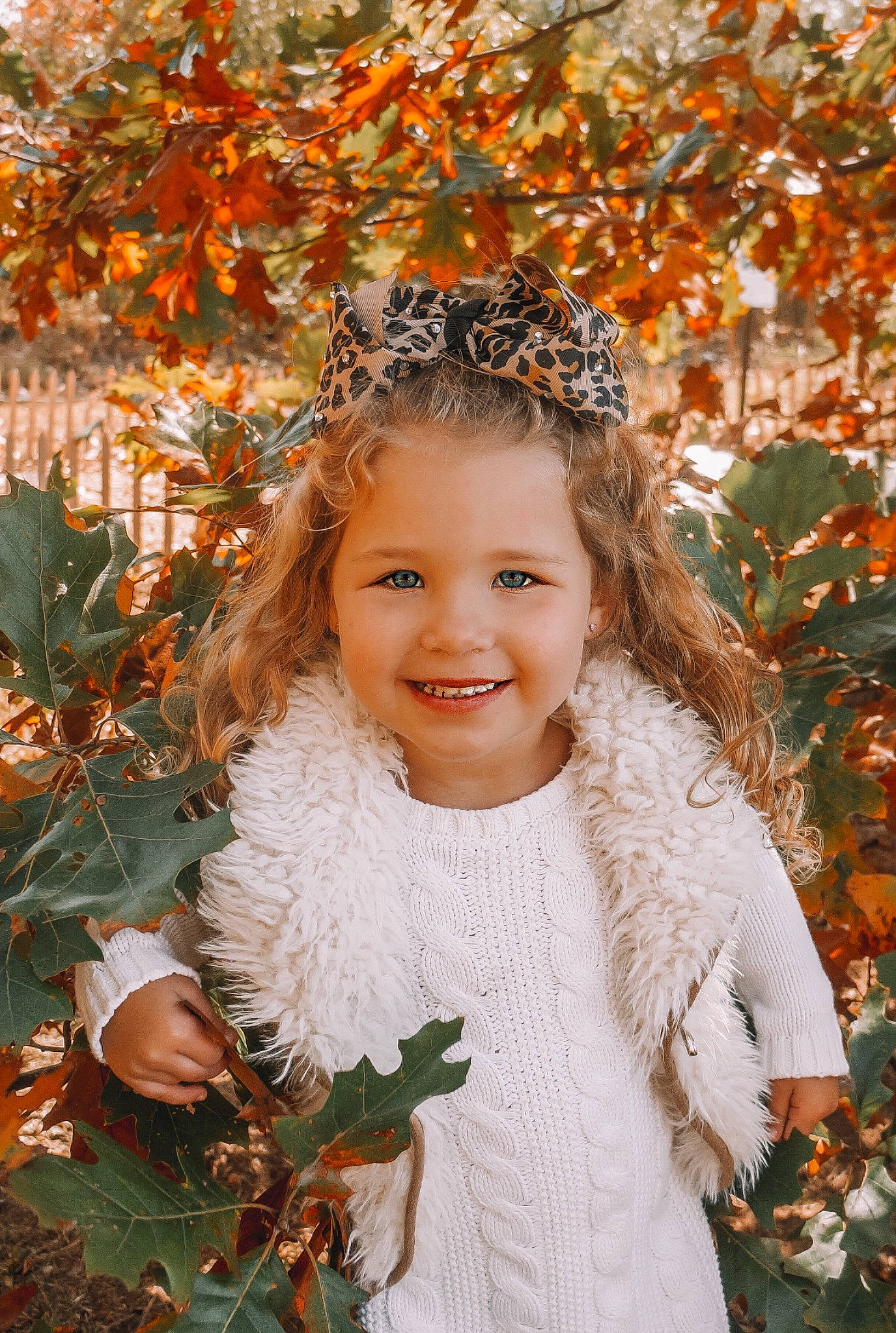 Ellestyn is registered to the contest to win money with this photo: botany, branch, dress, eye, face, fawn, grass, hair, happy, head, iris, joy, leaf, nature, outerwear, people_in_nature, person, plant, smile, textile