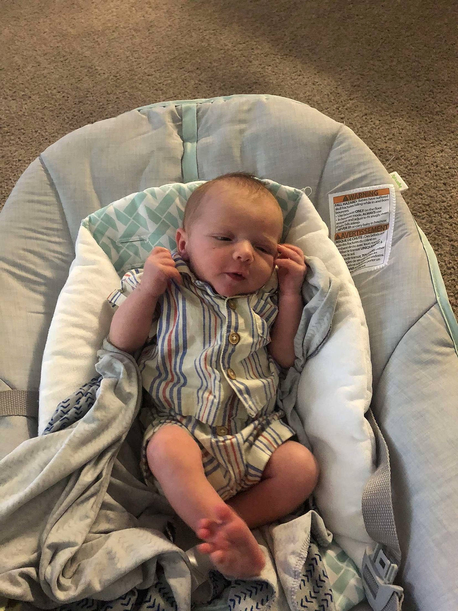 Kingston is registered to the contest to win money with this photo: baby, baby_carriage, baby_products, baby_toddler_clothing, cheek, child, comfort, foot, fun, human_leg, lap, leg, linens, pattern, person, sitting, skin, sleep, thigh, thumb