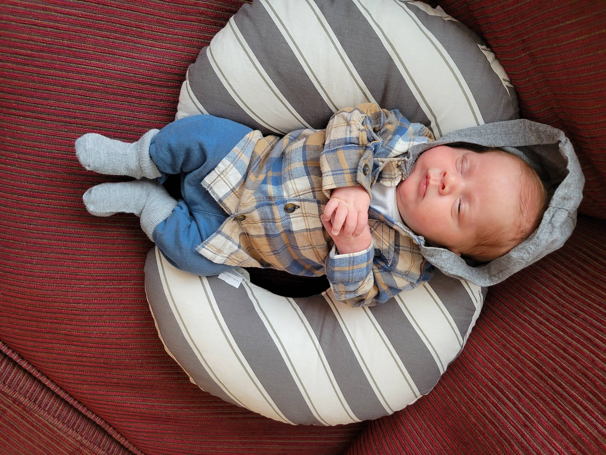 Waylon is registered to the contest to win money with this photo: baby, baby_carriage, baby_products, baby_safety, baby_sleeping, baby_toddler_clothing, child, circle, comfort, elbow, flooring, hardwood, pattern, person, room, sitting, sleeve, thumb, toddler, wood