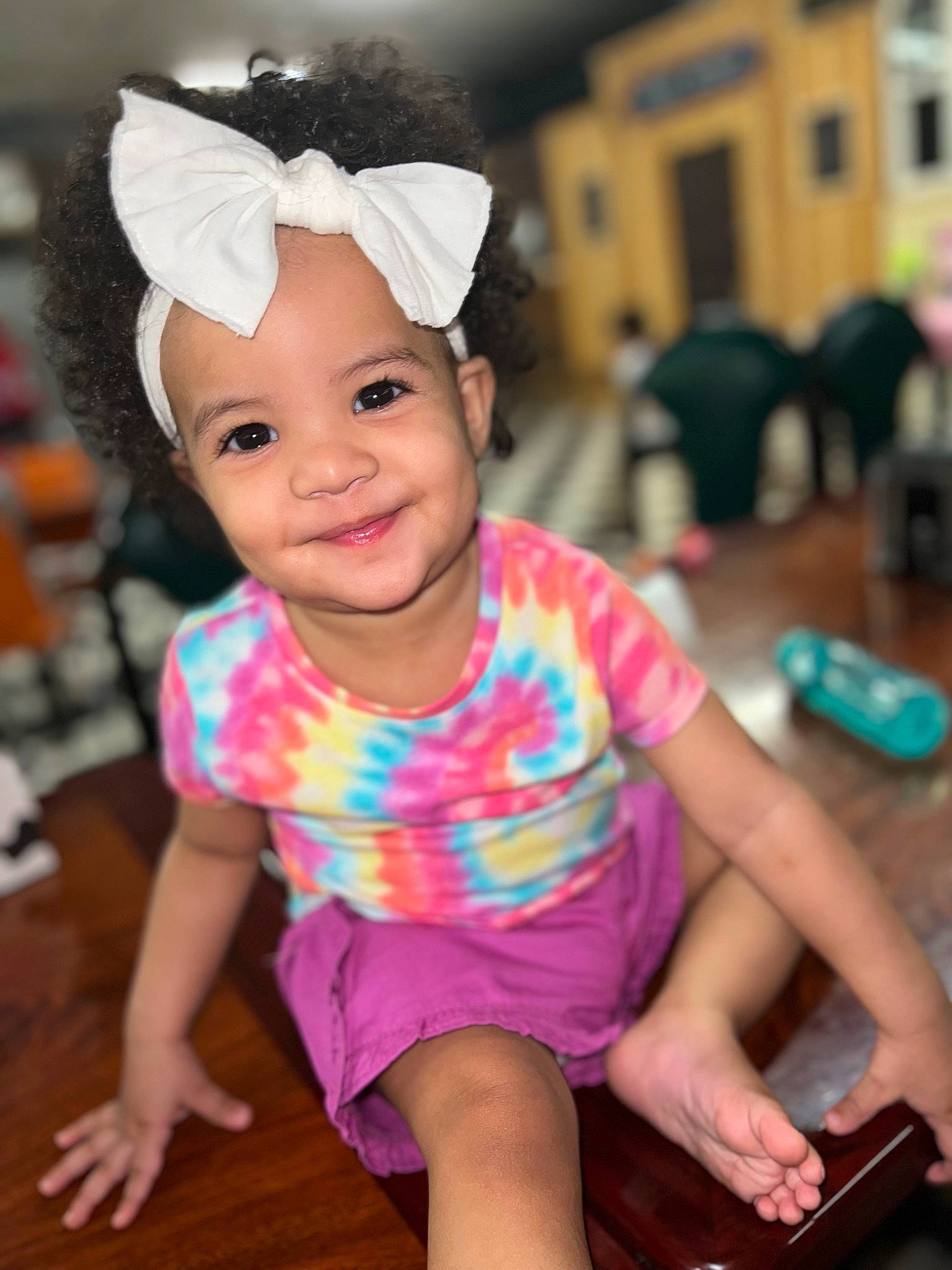 Taelynn joined the competition — help win amazing prizes! baby, baby_toddler_clothing, child, costume_hat, event, fashion_accessory, fun, happy, hat, headband, headwear, joy, leisure, magenta, party, party_supply, person, pink, sitting, skin
