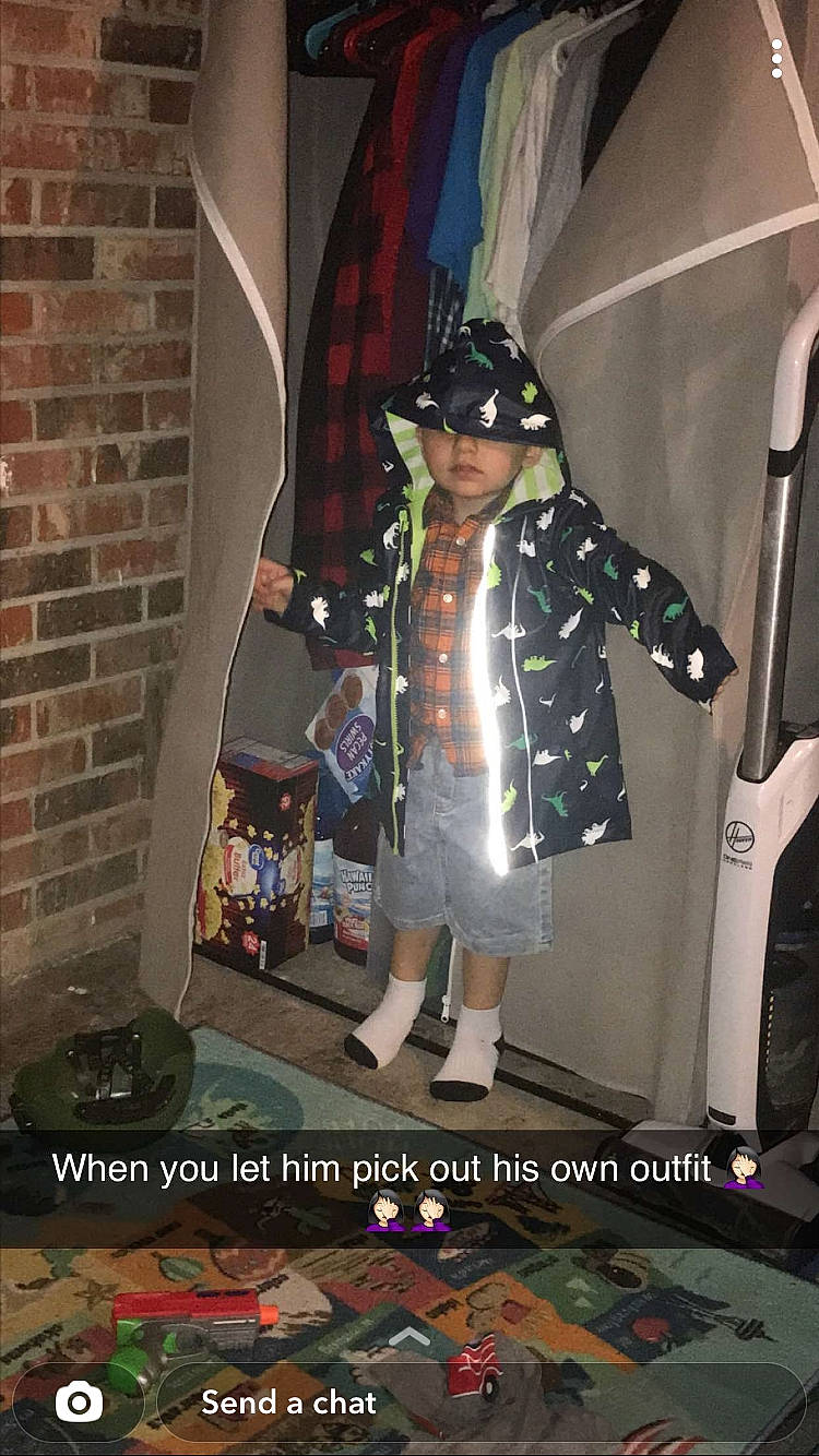 Evan is registered to the contest to win money with this photo: boot, brick, brickwork, child, cool, costume, curtain, door, event, fashion_accessory, fashion_design, flooring, fun, fur, headwear, holiday, pattern, person, photo_caption, room