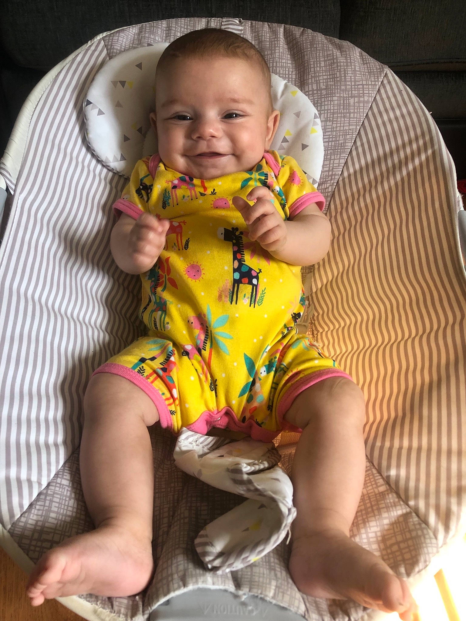 Layla-mae is registered to the contest to win money with this photo: baby, car_seat, child, eating, person, product, sitting, skin, smile, toddler, yellow