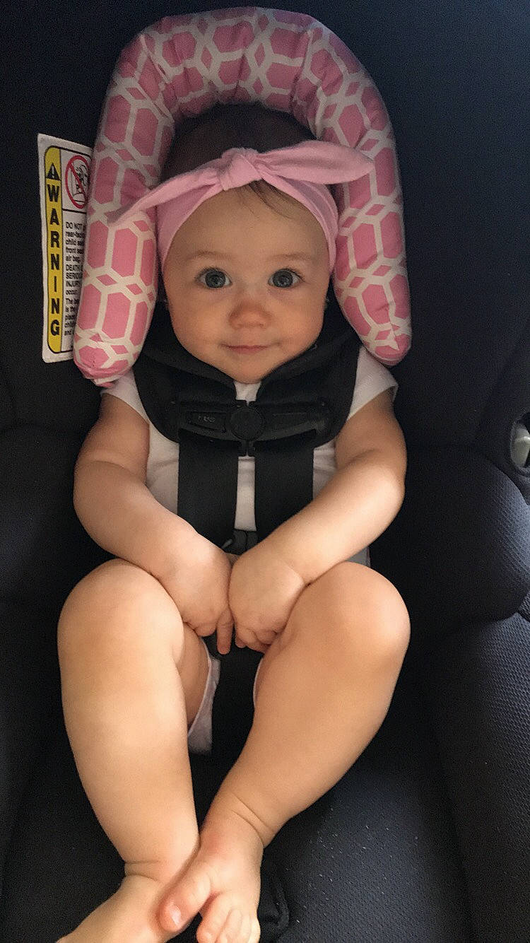 Aria Jade joined the competition — help win amazing prizes! auto_part, baby, car_seat, cheek, child, hand, leg, person, pink, sitting, thigh, toddler