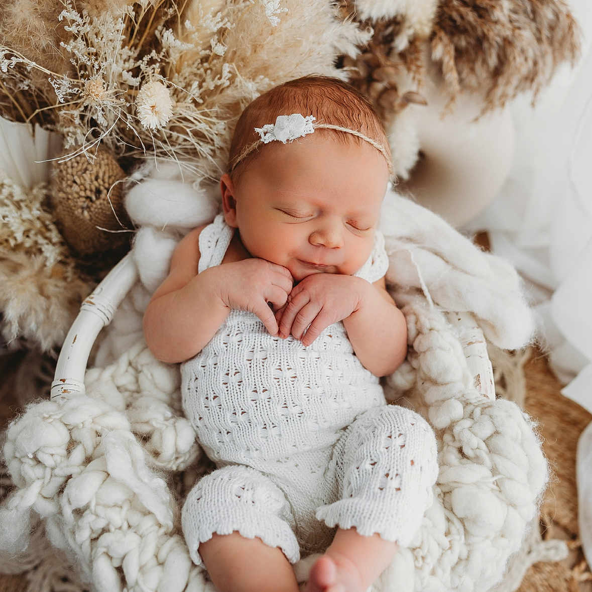Martina is registered to the contest to win money with this photo: baby, basket, blanket, cozy, cute, dried_flowers, feet, floral_arrangement, hands, headband, indoors, infant, knitted_outfit, newborn, peaceful, portrait, rest, sleeping, soft_texture, white_clothing