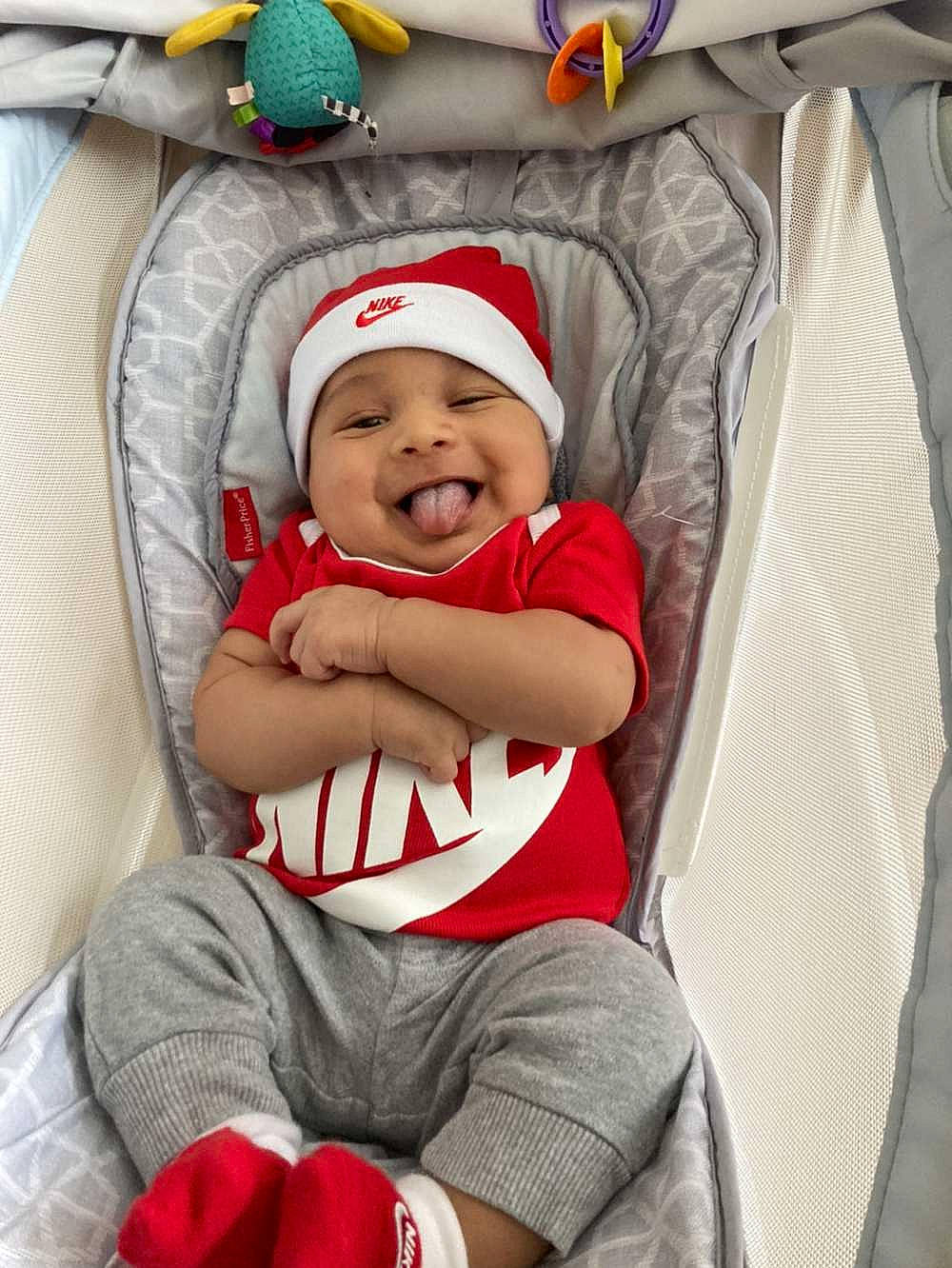 Jedidiah joined the competition — help win amazing prizes! baby, baby_toddler_clothing, cap, child, comfort, event, fun, happy, hat, headgear, headwear, lap, leg, leisure, person, red, shorts, smile, t_shirt, thigh