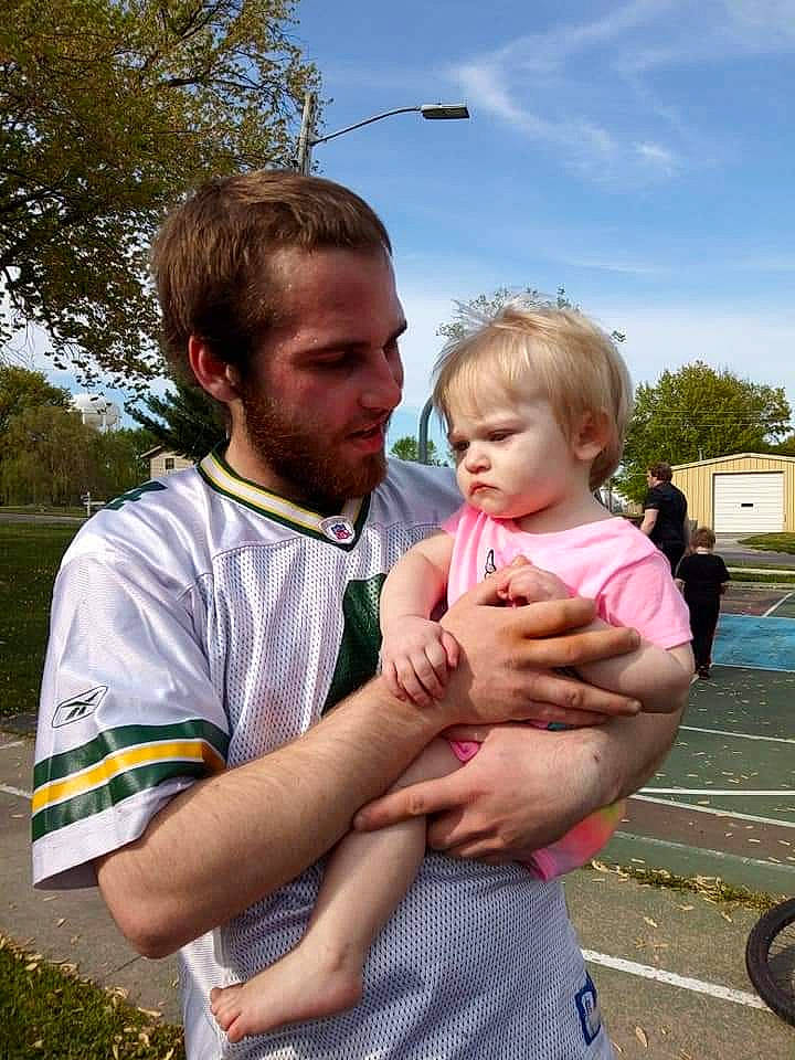 Keelyn is registered to the contest to win money with this photo: baby, child, family, finger, gesture, grass, hand, happy, interaction, people, person, photography, recreation, summer, thumb, toddler, vacation