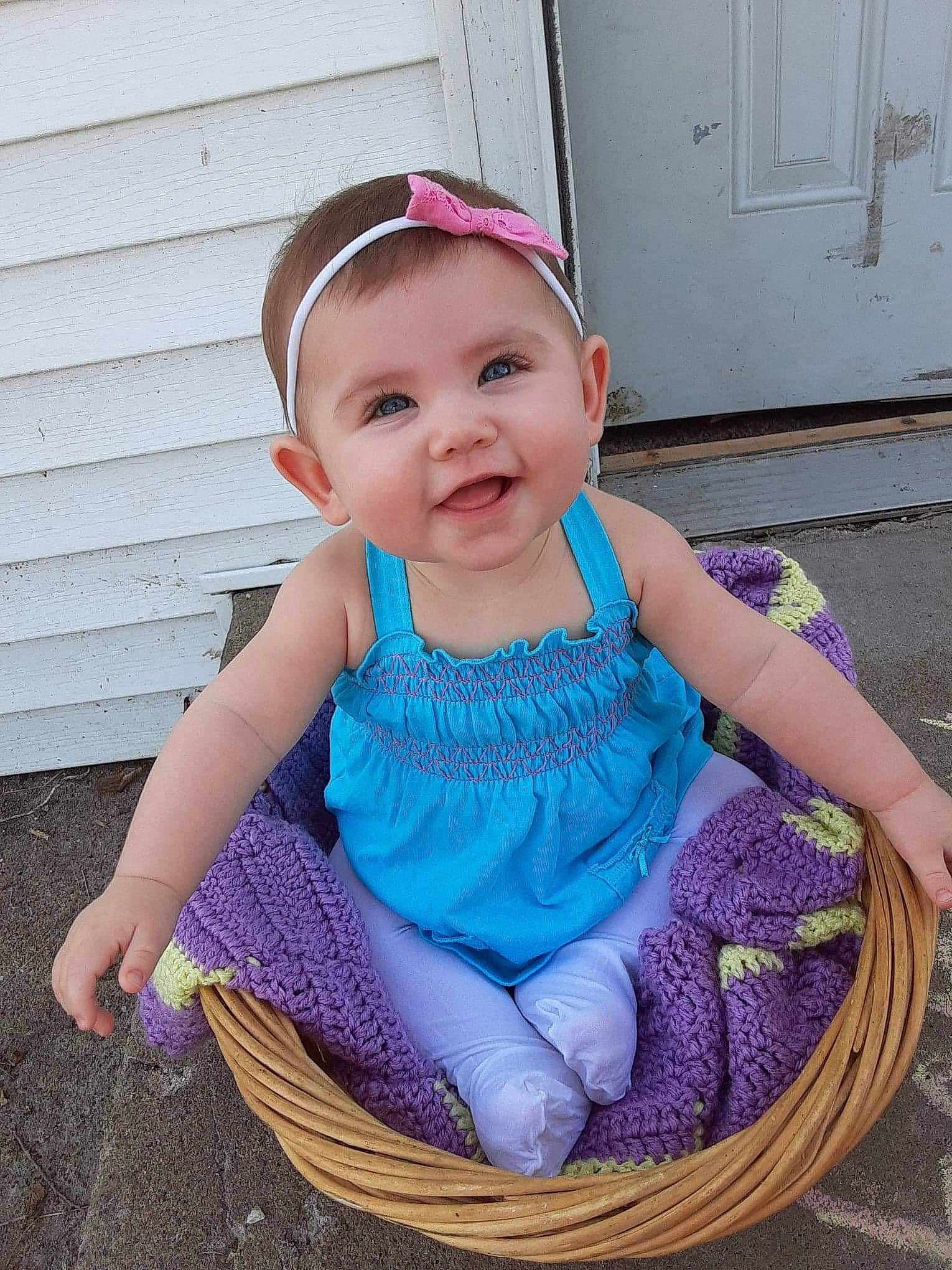 Love is registered to the contest to win money with this photo: baby, baby_products, baby_toddler_clothing, basket, child, clothing, costume, costume_accessory, crochet, dress, fashion_accessory, hair_accessory, headband, headgear, joy, knitting, pattern, person, pink, purple