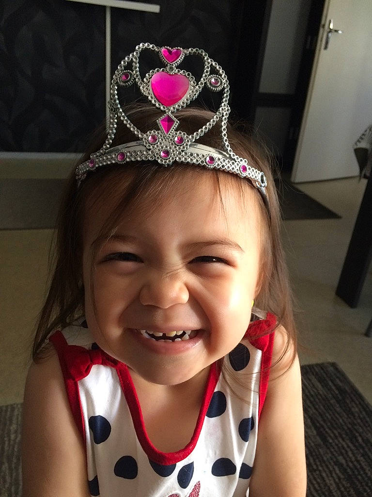 Lyna participe au concours pour gagner de l'argent avec cette photo : child, crown, ear, fashion_accessory, forehead, hair_accessory, head, headband, headgear, headpiece, jewellery, joy, person, pink, smile, tiara, toddler