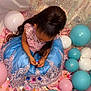 balloon, birthdaycake, bodypart, cake, clothing, confetti, dress, face, finger, hand, head, inflatable, paper, people, person, photography, portrait, purple, sphere, turquoise