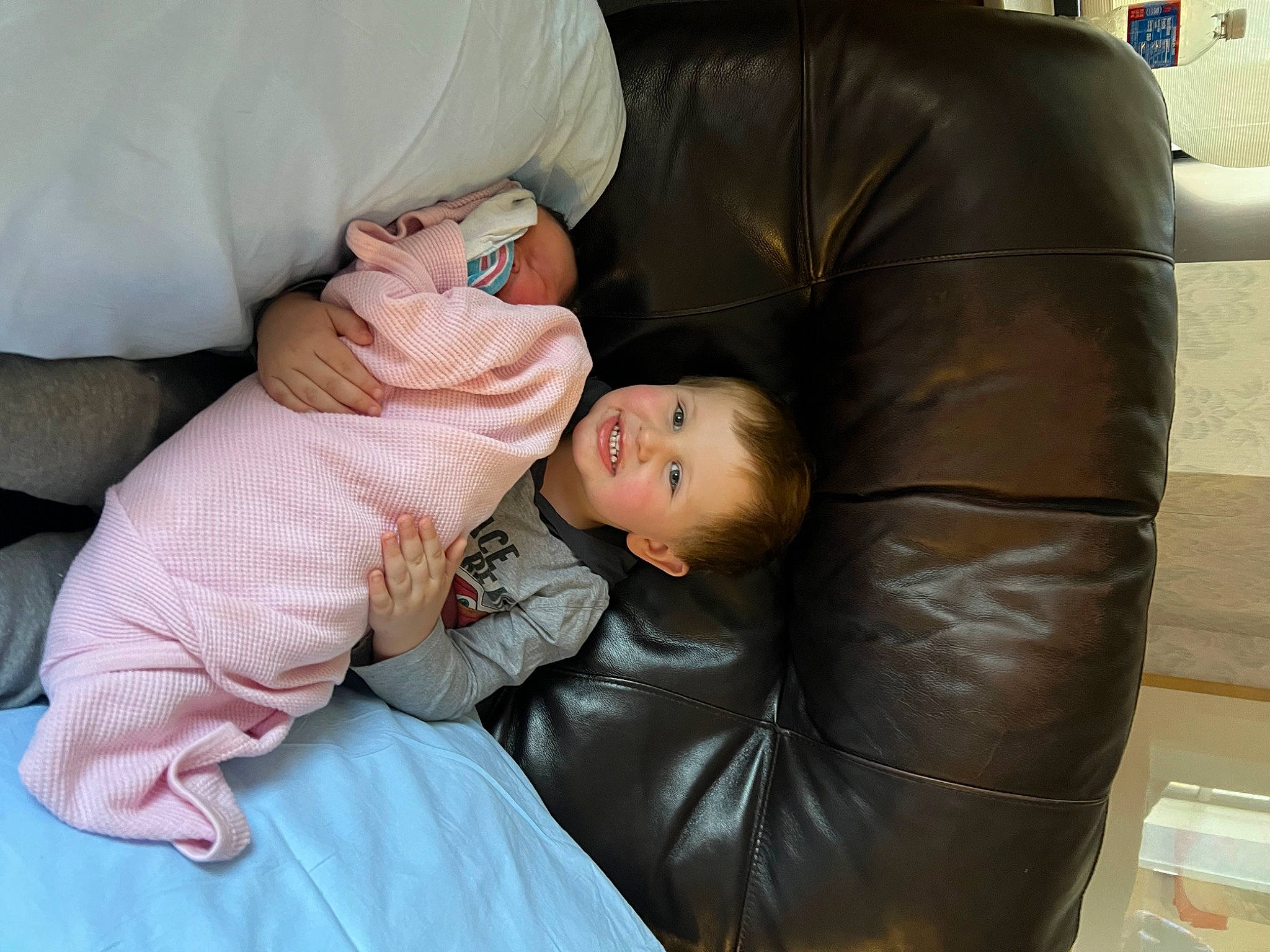 Bentley joined the competition — help win amazing prizes! baby, baby_products, baby_toddler_clothing, bean_bag, bean_bag_chair, cheek, child, comfort, foot, human_leg, joy, knee, lap, leather, leg, person, room, service, sitting, thigh