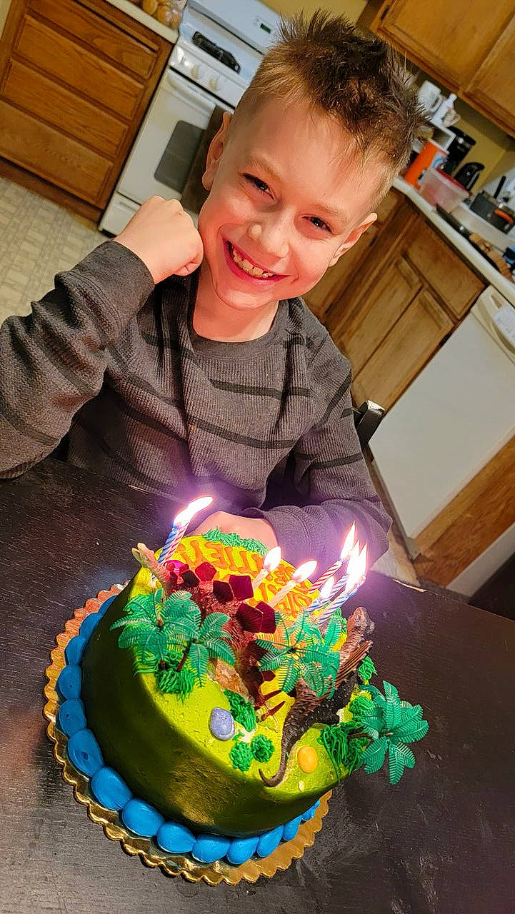 Bentley joined the competition — help win amazing prizes! baked_goods, birthday, birthday_cake, birthday_candle, buttercream, cake, cake_decorating, cake_decorating_supply, candle, cuisine, face, food, joy, kitchen_appliance, person, plant, plate, smile, sugar_cake, sugar_paste