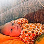 Stetson is registered to the contest to win money with this photo: baby, infant, pumpkin_outfit, orange_blanket, hay, autumn, fall, cozy, cute, face, portrait, child, seasonal, soft_light, nature, resting, sleepwear, holiday_theme, closeup, warm_colors