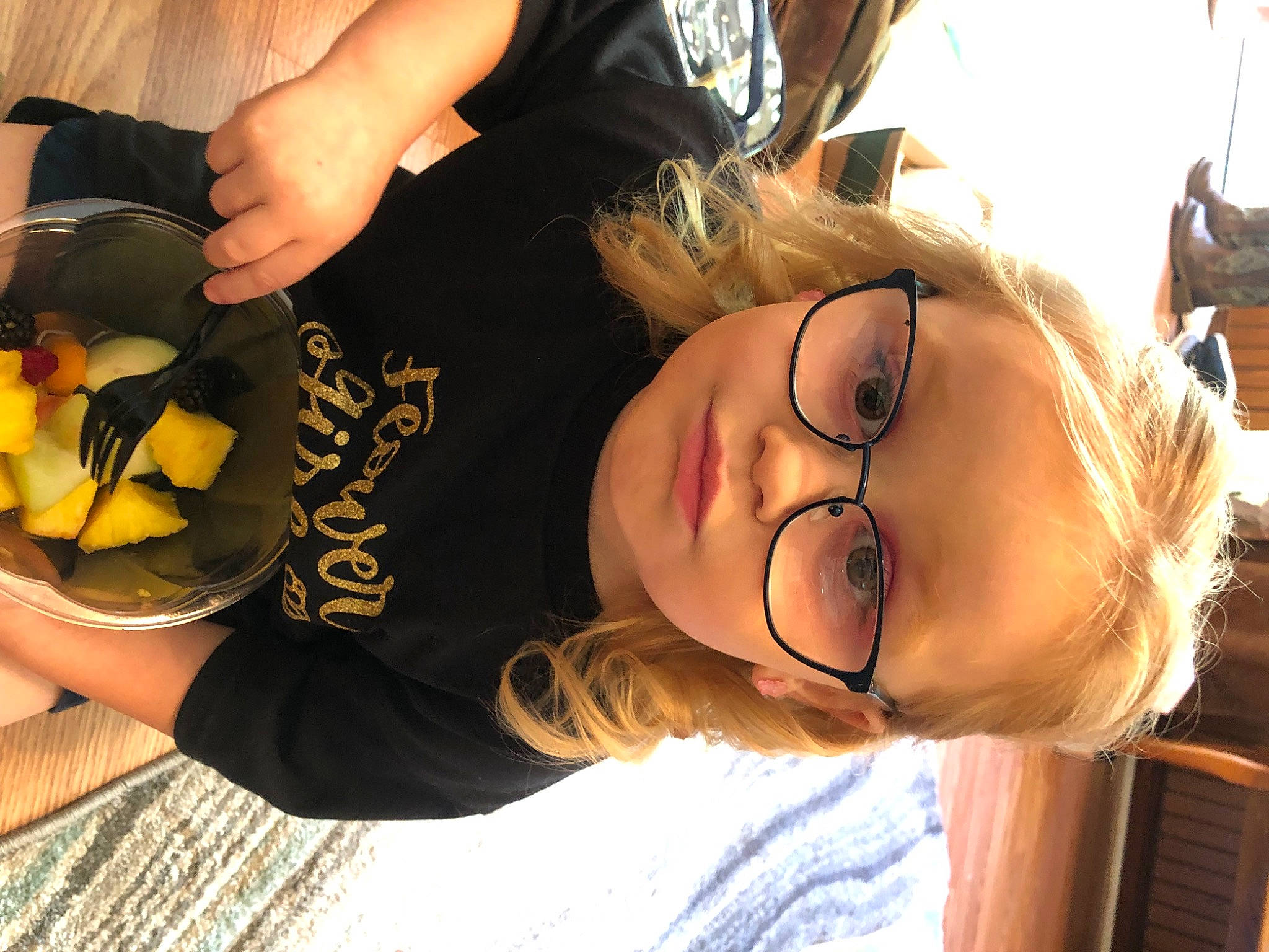 Adeline is registered to the contest to win money with this photo: bangs, black_hair, brown_hair, child, comfort_food, cooking, cuisine, dish, eyelash, eyewear, fast_food, finger, food, fun, happy, mouth, nail, person, tableware, toddler