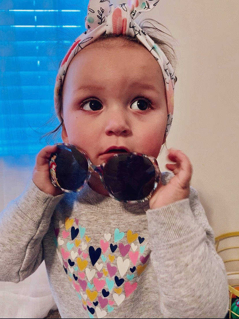 Baylee is registered to the contest to win money with this photo: baby, baby_toddler_clothing, bow_tie, drinking, drinkware, eyelash, eyewear, fashion_accessory, fun, happy, head, headband, headpiece, headwear, lip, neck, pattern, person, sleeve, sweetness