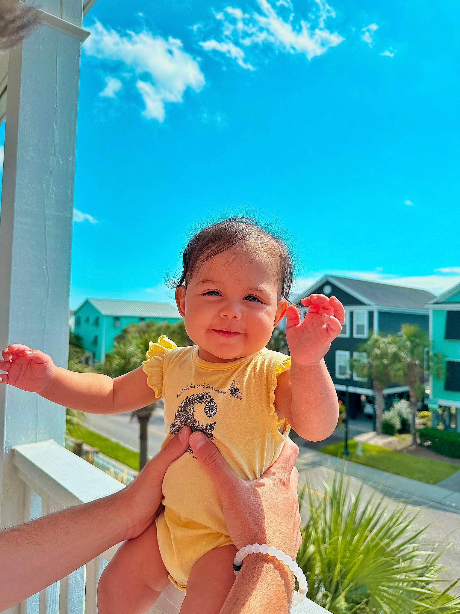 Emersyn is registered to the contest to win money with this photo: baby, baby_toddler_clothing, blue, child, city, cloud, fun, grass, happy, joy, leisure, people_in_nature, person, plant, recreation, sitting, skin, sky, smile, thumb