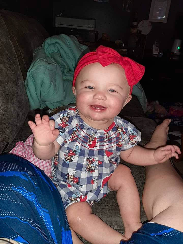 Lillianna Blume is registered to the contest to win money with this photo: baby_toddler_clothing, baseball_cap, blue, cap, cheek, comfort, cool, eye, finger, flash_photography, fun, happy, head, headwear, joy, lap, mouth, person, purple, skin