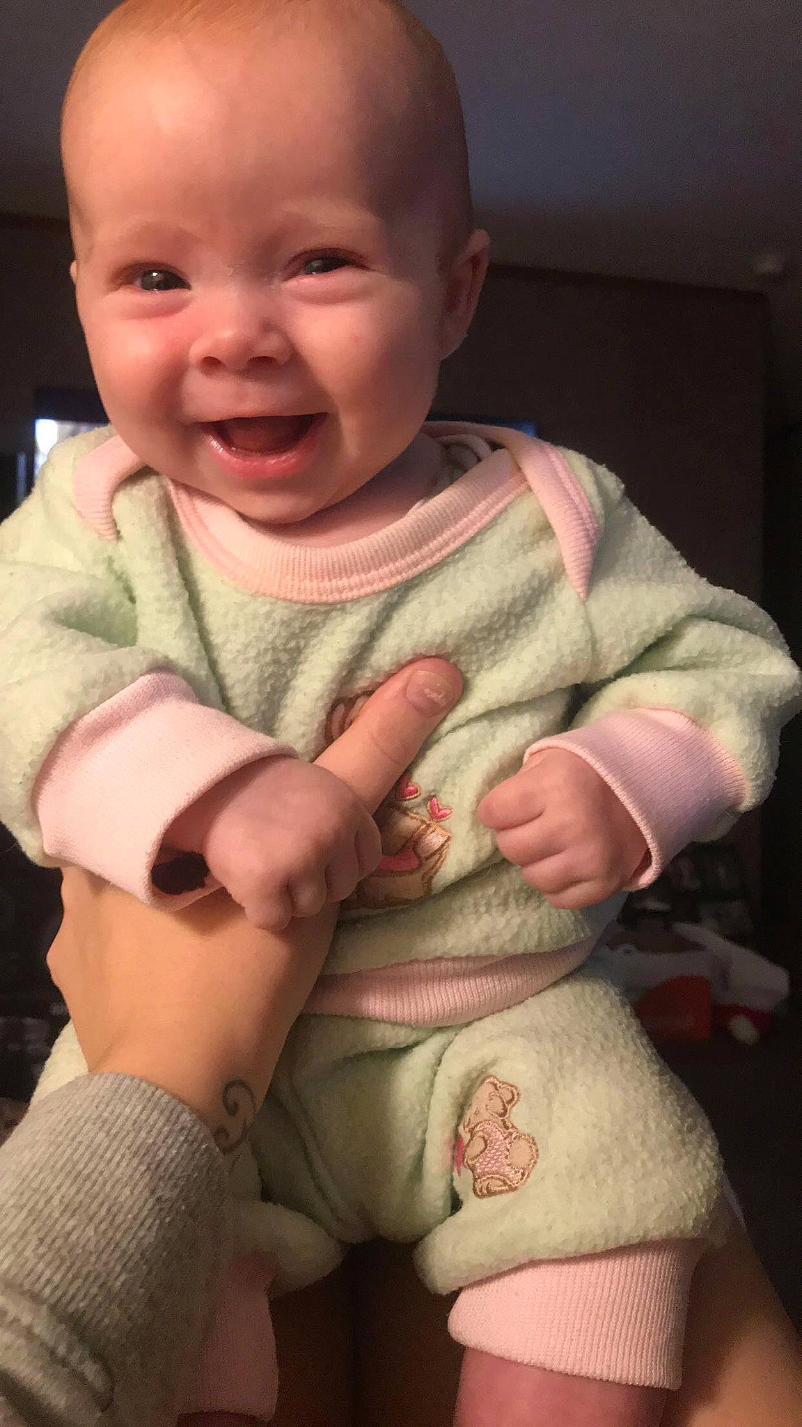 Haylin is registered to the contest to win money with this photo: arm, baby, cheek, child, finger, hand, joy, mouth, person, skin, smile, thumb, toddler