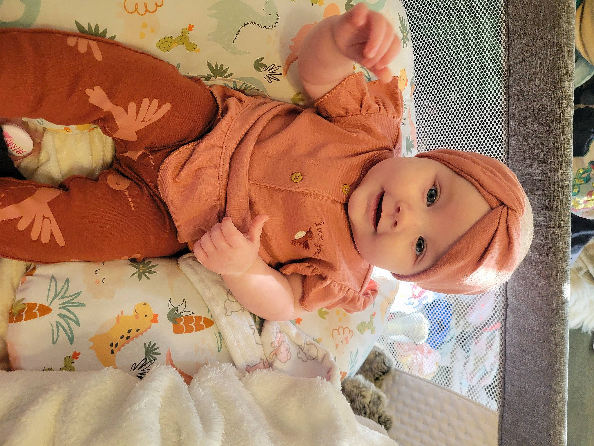 Hazel is registered to the contest to win money with this photo: abdomen, art, baby, baby_sleeping, bedding, cheek, child, comfort, eye, eyelash, happy, hat, head, headwear, human_body, linens, person, room, skin, textile