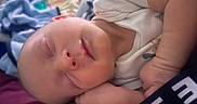Walker is registered to the contest to win money with this photo: baby, sleeping, child, infant, blanket, soft, cute, peaceful, closeup, skin, hand, face, nap, rest, indoors, clothing, comfort, portrait, newborn, toddler