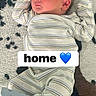 Walker joined the competition — help win amazing prizes! newborn, baby, sleeping, pajamas, striped_clothing, infant, floor, rug, patterned_rug, footed_pajamas, peaceful, resting, indoors, child, face, small_person, cute, soft_lighting, home, cozy