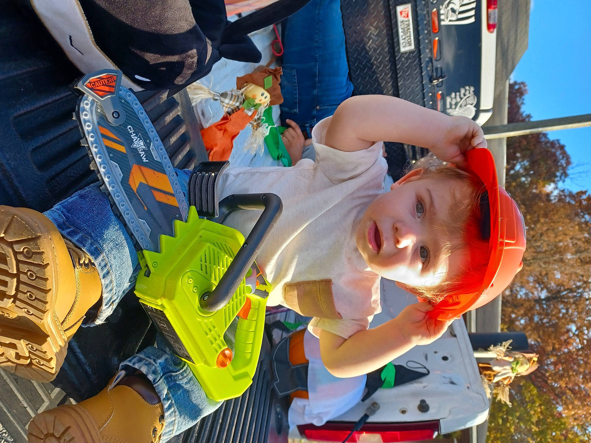 Larry joined the competition — help win amazing prizes! auto_part, baby_products, child, city, fun, leisure, motor_vehicle, orange, person, personal_protective_equipment, plastic, play, recreation, sky, smile, t_shirt, toddler, toy, tree, vehicle_door