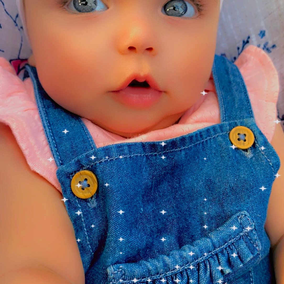 Sofia joined the competition — help win amazing prizes! azure, baby, baby_toddler_clothing, cheek, chin, eye, eyebrow, eyelash, human_body, iris, lip, mouth, neck, nose, outerwear, pink, skin, sleeve, standing, textile