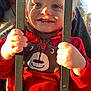 Wyatt joined the competition — help win amazing prizes! toddler, child, smiling, red_jacket, bear_design, hands, bars, sunlight, shadow, face, outdoor, daylight, person, happy, cute, clothing, holding, portrait, baby, background