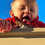 Wyatt joined the competition — help win amazing prizes! child, toddler, face, tongue, red_jacket, hand, outdoor, blue_sky, playful, portrait, person, cute, expression, young, clothing, sunlight, daylight, closeup, fun, happy
