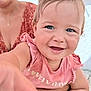 toddler, child, smiling, blue_eyes, pigtails, pink_shirt, person, adult, hand, portrait, happy, closeup, skin, outdoor, female, baby, clothing, face, cute, expression