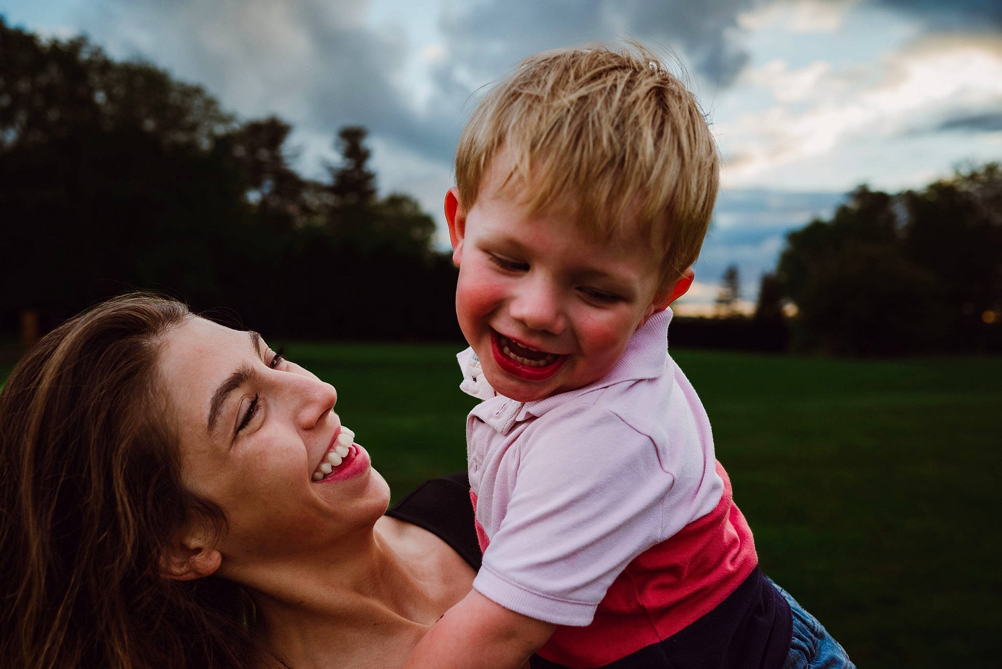 Donneghan is registered to the contest to win money with this photo: blond, child, cloud, event, face, flash_photography, fun, gesture, grass, happy, joy, leisure, meadow, people_in_nature, person, plant, sky, smile, summer, sunlight