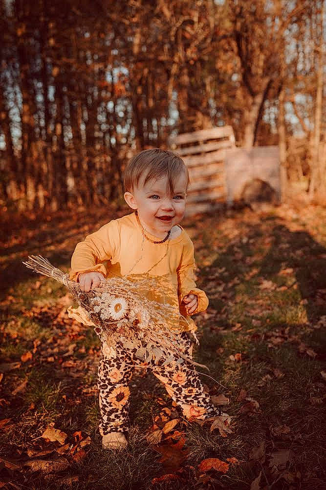 Maisy joined the competition — help win amazing prizes! branch, deciduous, eye, flash_photography, forest, fun, grass, happy, joy, leisure, people_in_nature, person, plant, sitting, smile, soil, sunlight, tints_and_shades, toddler, tree