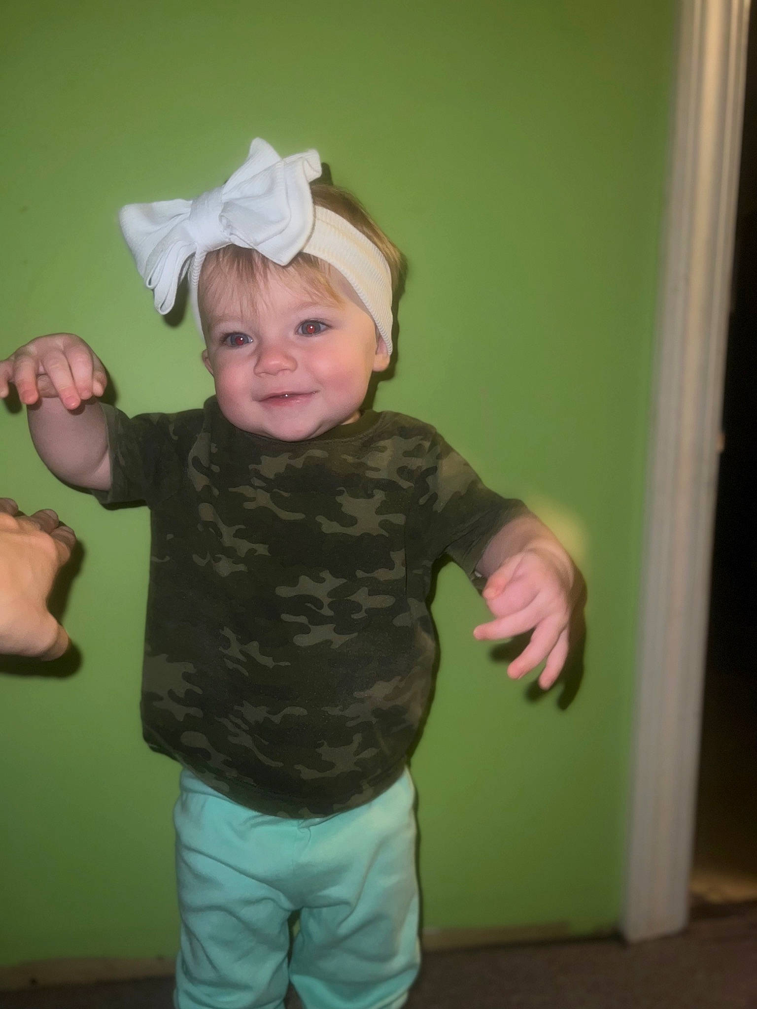 Maisy joined the competition — help win amazing prizes! baby, baby_toddler_clothing, cheek, child, fun, gesture, happy, hat, headwear, joy, pattern, person, room, sleeve, smile, t_shirt, thumb, toddler