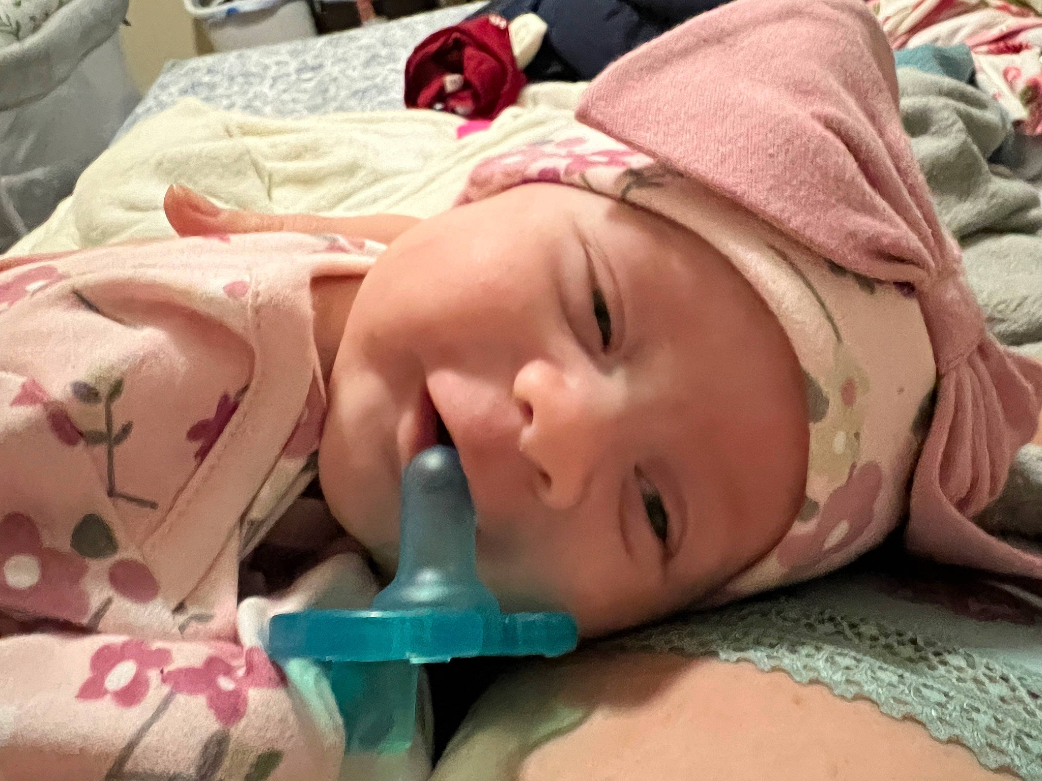 Amara is registered to the contest to win money with this photo: baby, baby_products, baby_toddler_clothing, bedtime, cheek, child, chin, close_up, comfort, eyebrow, eyelash, happy, head, headwear, linens, lip, mouth, nose, person, pink