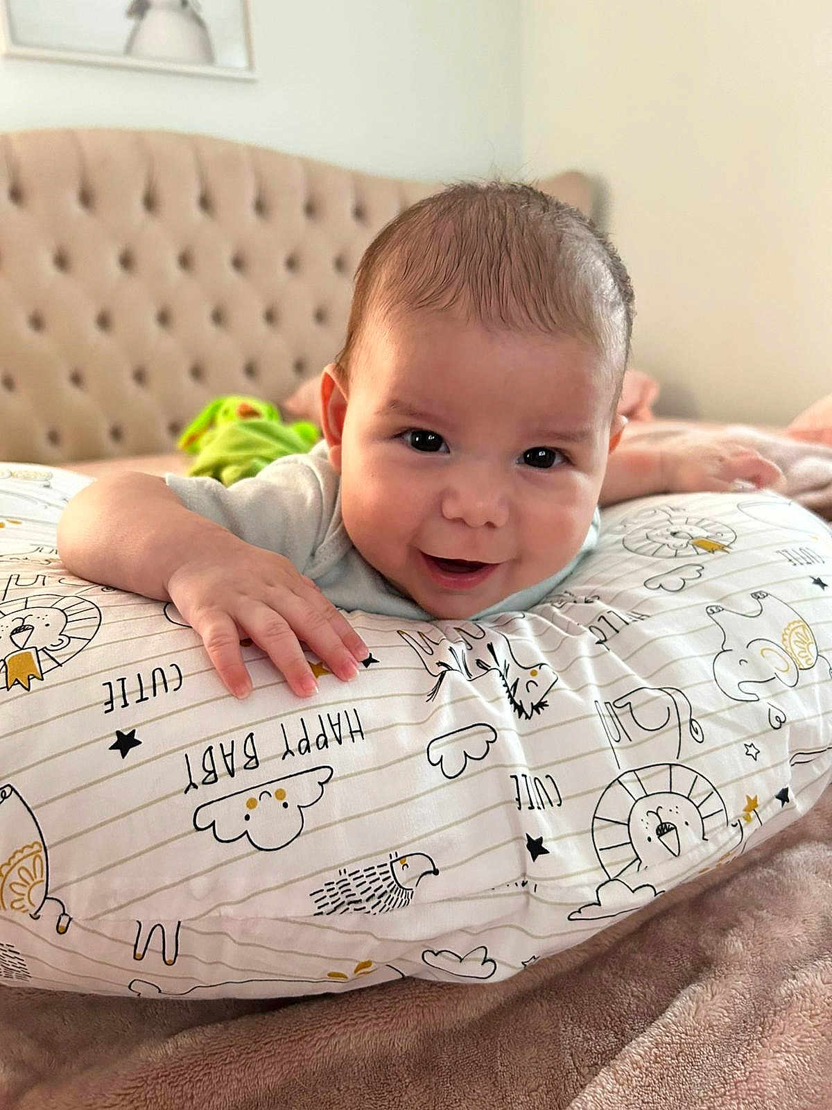 Nikolas joined the competition — help win amazing prizes! animal_drawing, baby, bedroom, blanket, child, comfort, cute, face, hand, happy, headboard, indoors, infant, pattern, person, pillow, portrait, smiling, soft_texture, young
