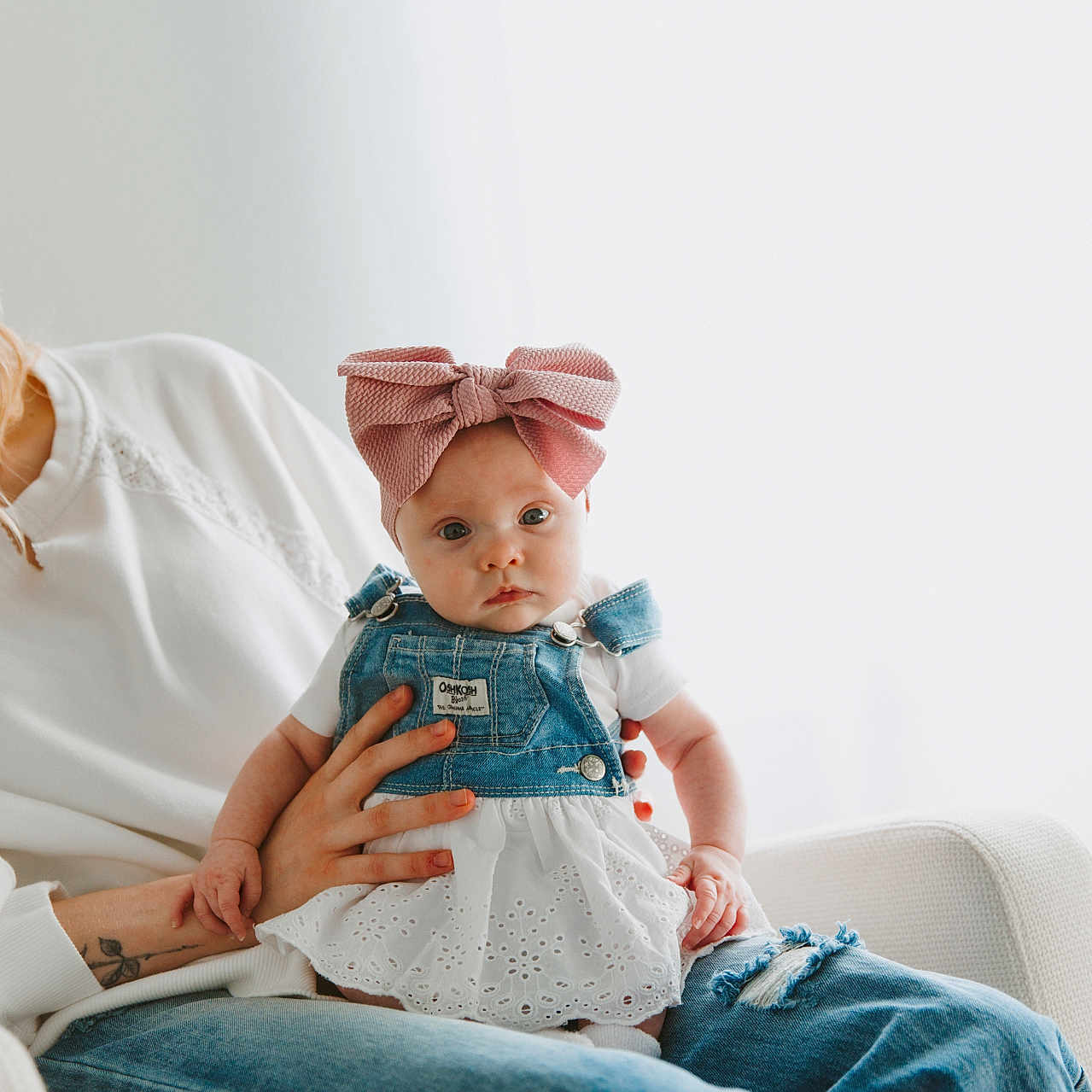 Laura Lynn is registered to the contest to win money with this photo: accessories, adult, blouse, clothing, couch, face, family, female, furniture, happy, head, jeans, pants, people, person, photography, portrait, sitting, smile, woman