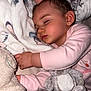 Rose a rejoint le concours — aidez-le/la à gagner de superbes lots ! baby, sleeping, blanket, stuffed_toy, soft_toy, pink_clothing, child, face, hand, bed, cozy, cute, indoors, resting, peaceful, infant, toddler, plush, comfort, nap