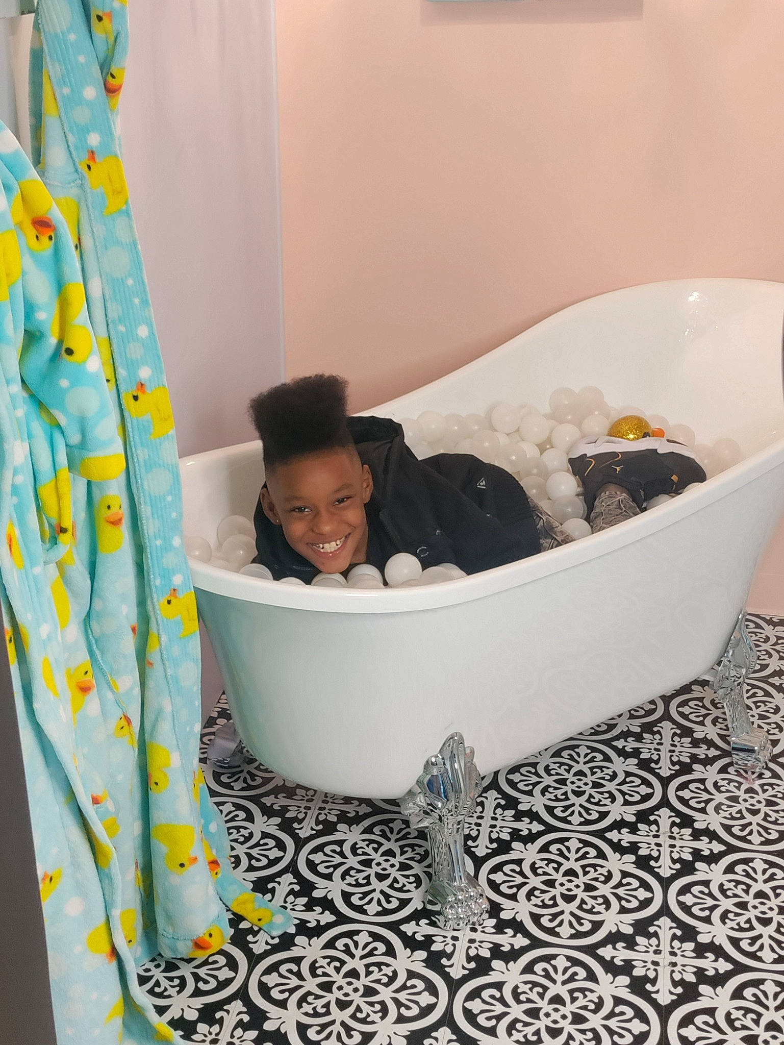 Ta'Kylen joined the competition — help win amazing prizes! baby_products, baby_safety, bag, bathroom, bathtub, child, comfort, curtain, flooring, household_supply, interior_design, joy, linens, pattern, person, plumbing_fixture, product, rectangle, room, smile