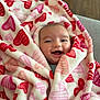 Joseph joined the competition — help win amazing prizes! baby, blanket, child, comfort, couch, cozy, cute, face, furniture, happy, head, heart_pattern, indoors, infant, person, portrait, smiling, soft, warm, wrapped