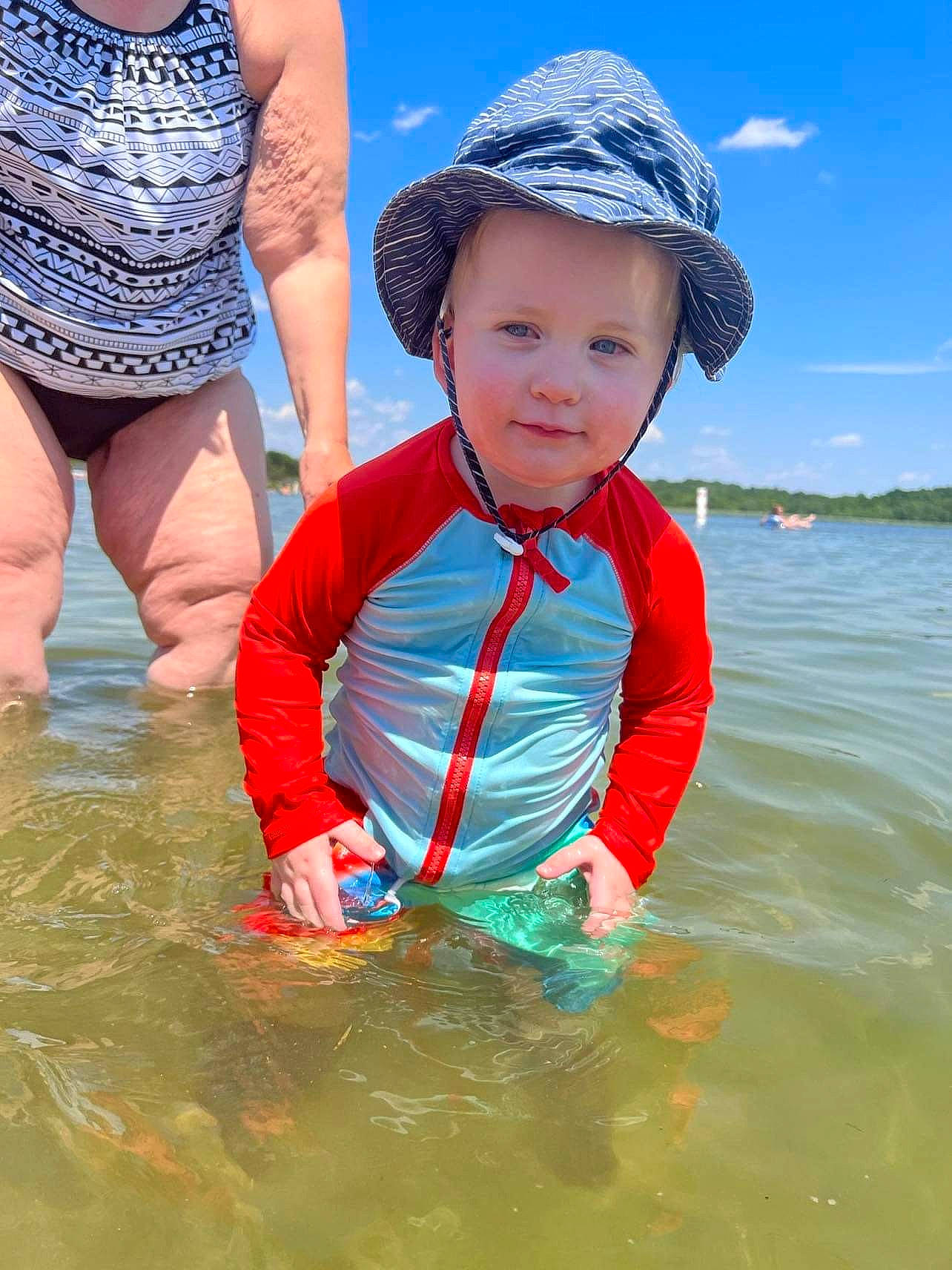 Lawton joined the competition — help win amazing prizes! azure, blue, child, clothing, cloud, fun, happy, hat, head, headgear, headwear, lake, leisure, lifejacket, people_in_nature, people_on_beach, person, recreation, sky, sun_hat
