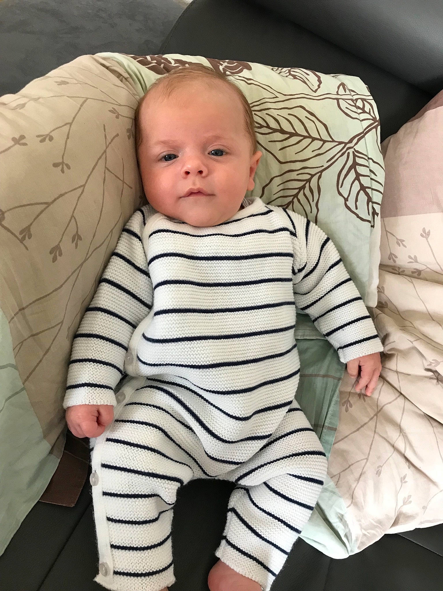 Erwann participe au concours pour gagner de l'argent avec cette photo : arm, baby, baby_products, baby_toddler_clothing, cheek, child, head, person, product, skin, sleeve, toddler