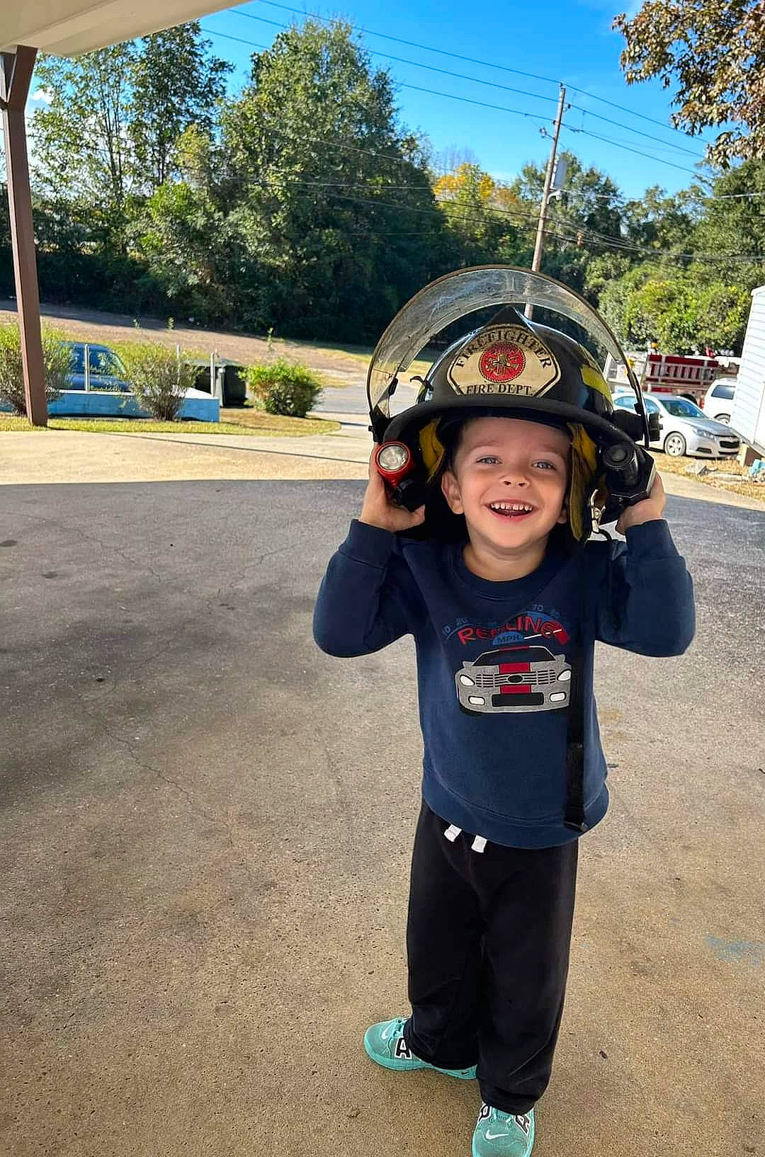 Elijah is registered to the contest to win money with this photo: asphalt, bicycle_helmet, bicycles_equipment_and_supplies, fun, happy, hat, headgear, headwear, helmet, joy, leaf, leisure, person, personal_protective_equipment, plant, recreation, sky, sleeve, smile, t_shirt