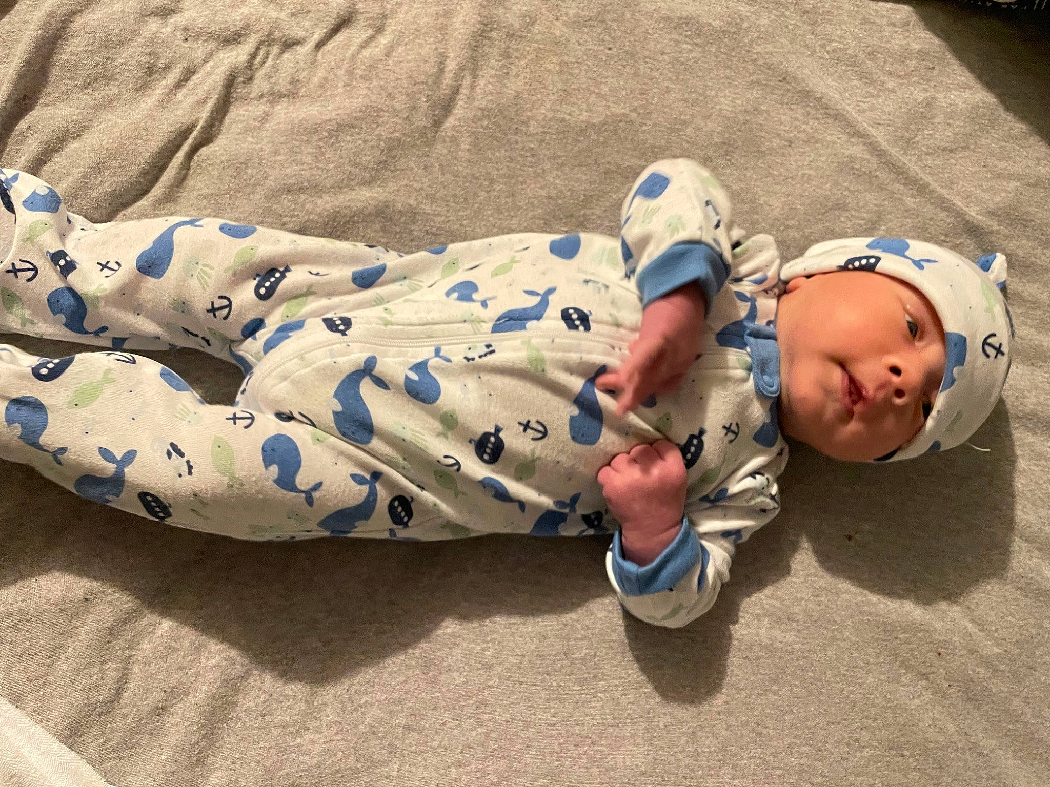 Camden joined the competition — help win amazing prizes! baby, baby_products, baby_toddler_clothing, baseball_cap, carmine, child, comfort, foot, fun, grass, headwear, human_body, human_leg, knee, leisure, pattern, person, sand, sitting, thigh