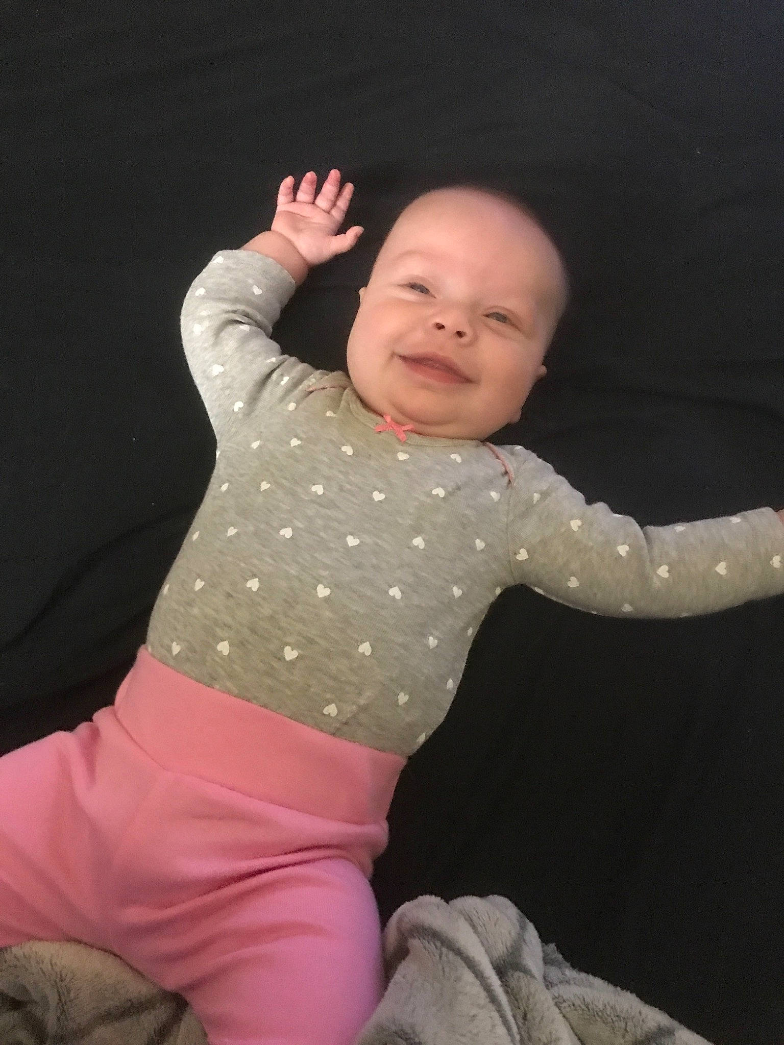 Elyse joined the competition — help win amazing prizes! arm, baby, cheek, child, fun, gesture, hand, neck, person, pink, skin, sleeve, smile, toddler