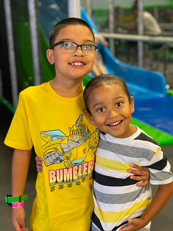 Markus is registered to the contest to win money with this photo: child, event, eyewear, fun, glasses, grass, happy, joy, leisure, people, person, play, recreation, sitting, skin, smile, summer, t_shirt, toddler, tourism