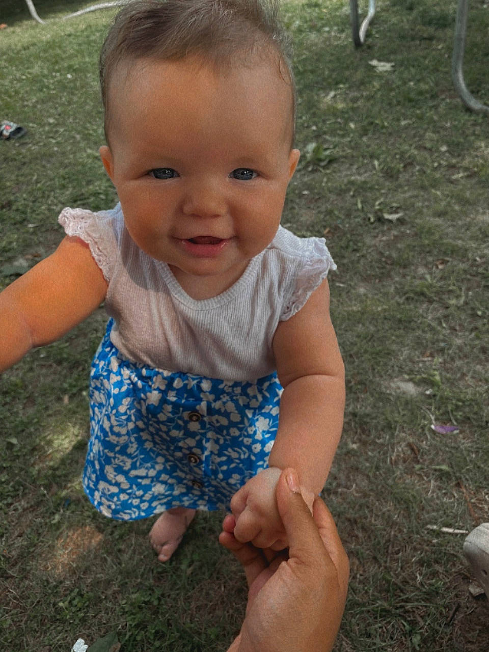 Nariah joined the competition — help win amazing prizes! baby_toddler_clothing, cool, eye, finger, grass, hair, hand, happy, head, iris, leaf, mammal, mouth, nature, nose, people_in_nature, person, skin, smile, standing