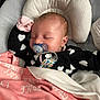Lynzee joined the competition — help win amazing prizes! baby, sleeping, pacifier, blanket, black_clothing, white_hearts, headrest, infant, cozy, nap, cute, indoor, child, soft_texture, pink_blanket, white_blanket, peaceful, resting, clothing, closeup